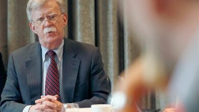 توصية بولتون للمستشار المستقبلي لألمانيا في علاج ترامب