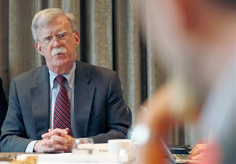 توصية بولتون للمستشار المستقبلي لألمانيا في علاج ترامب