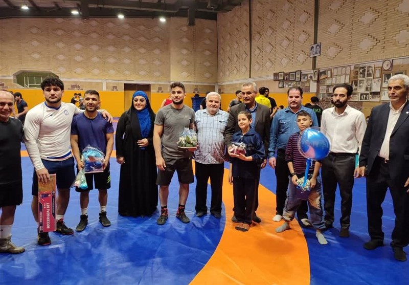 کودک اهوازی مبتلا به سرطان به آرزویش رسید/ آرین با قهرمان جهان کشتی گرفت + تصاویر