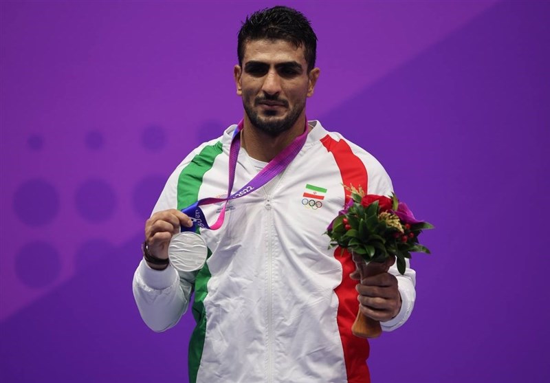 قهرمان ووشوی جهان: قهرمانی ملت ایران در پای صندوقهای رأی خواهد بود/ همه باید حضور یابیم + فیلم