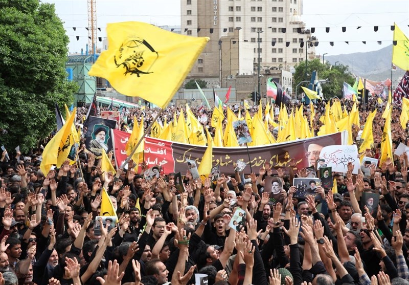 حضور خانواده فاطمیون و مهاجرین در تشییع میلیونی خادمالرضا