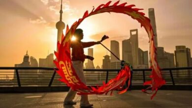 Shanghai Skyline Sets Stage for Traditional Dragon Dance Performance /Shanghai , China , Dragon Dance , Culture , Skyline