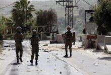 Two Palestinians Killed in West Bank Clash After Targeting Israeli Checkpoint /Hebron shooting , Palestinian casualties , Israeli soldiers injured , West Bank conflict , military checkpoint attack